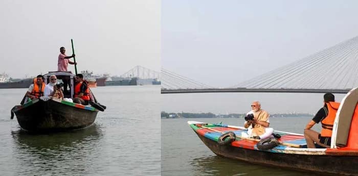 ক্যামেরা কাঁধে নৌকাবিহারে গঙ্গাবক্ষে নরেন্দ্র মোদি