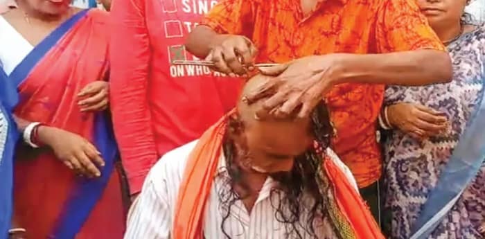 ১৫ বছর পর মাথার চুল কাটলেন বিজেপি সদস্য