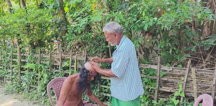 দল জিততেই ১৫ বছর পর চুল কাটালেন পদ্ম সমর্থক বাণেশ্বর