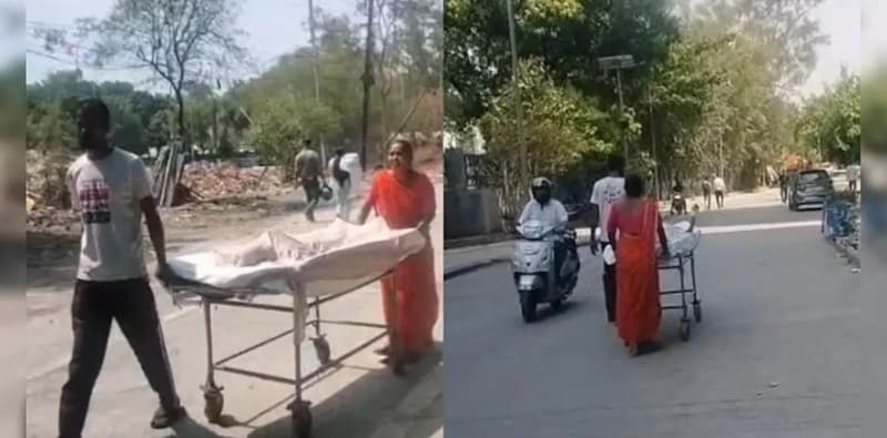 নেই স্টাফ বা অ্যাম্বুলেন্স, ছেলেকে স্ট্রেচারে করে হাসপাতালে বাবা-মা